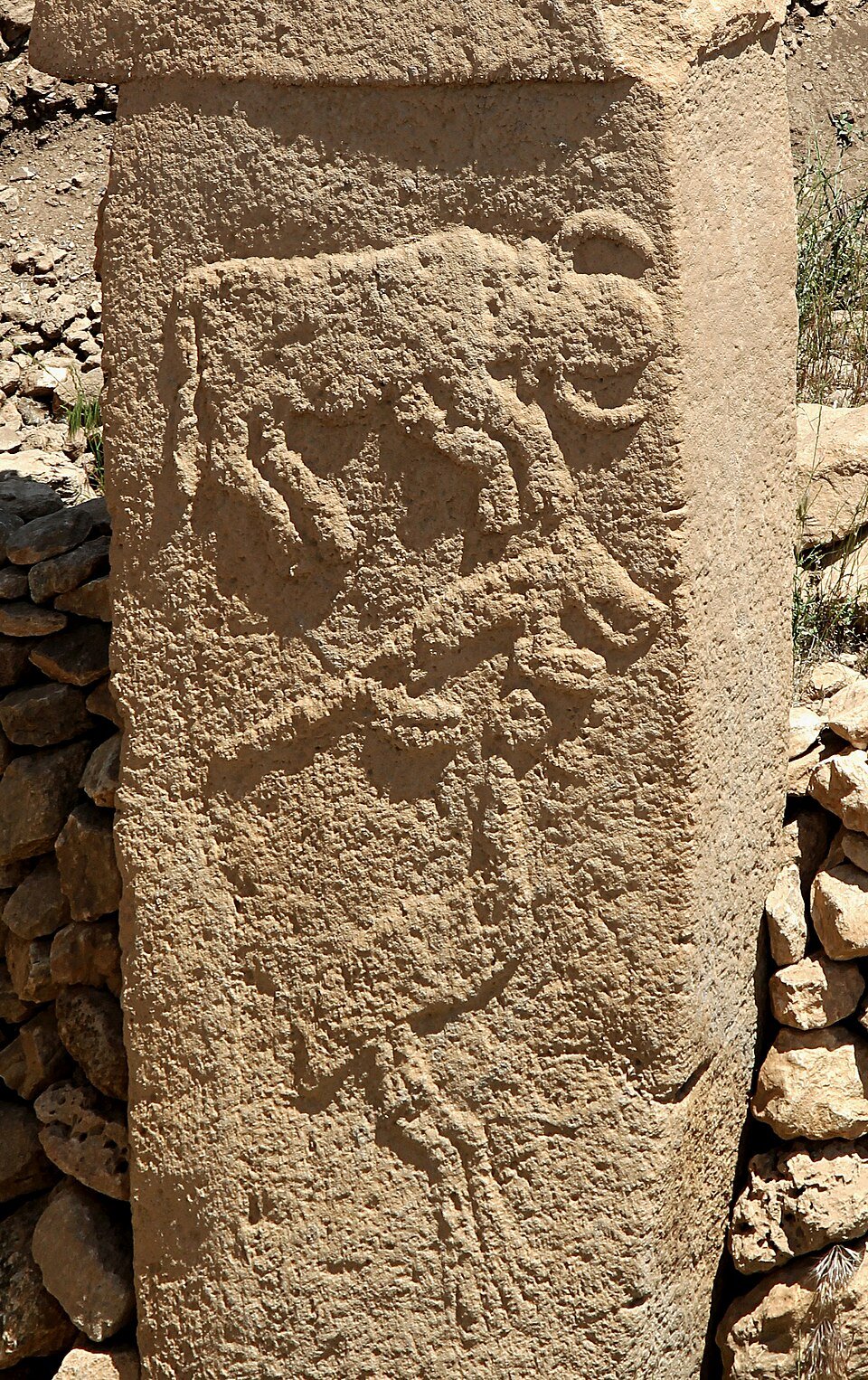 Detail of Enclosure B low-relief fox pillar carving