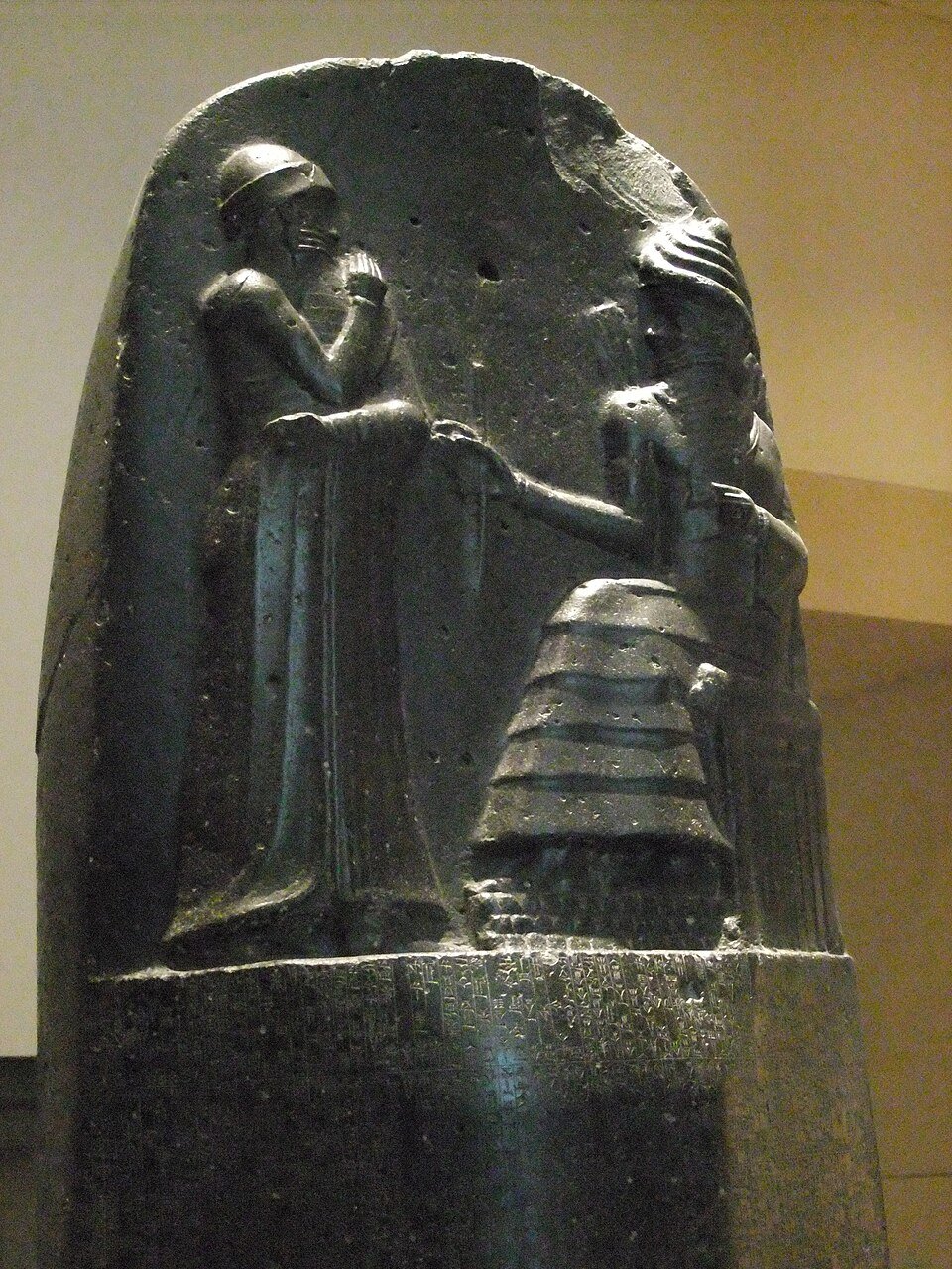 Top detail of Hammurabi standing before Shamash