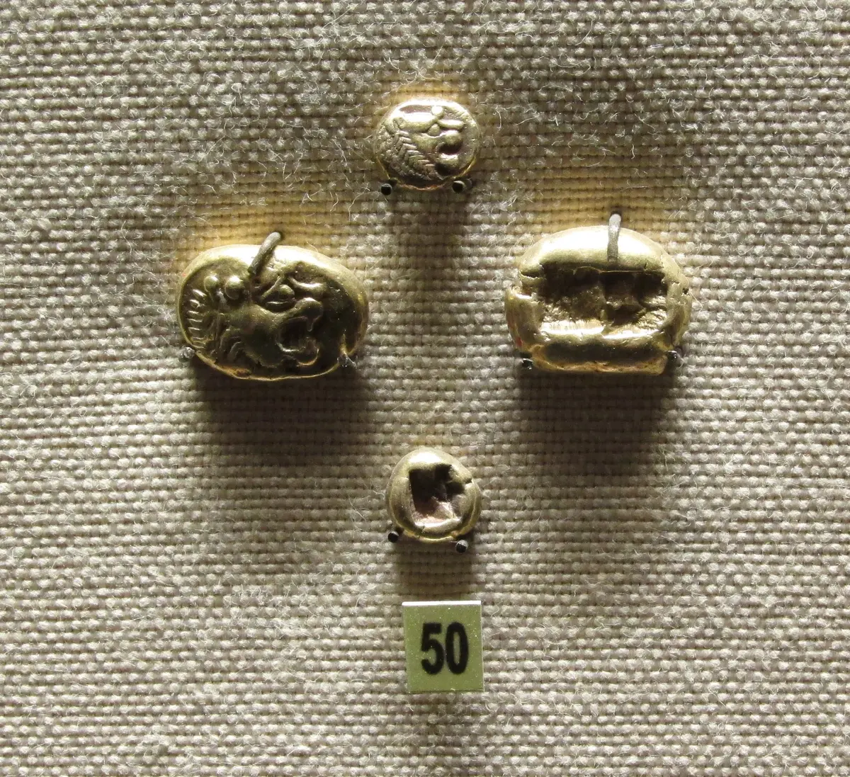 Lydian electrum stater coin showing a roaring lion