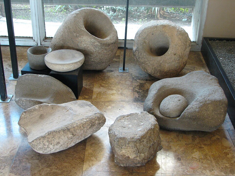 Neolithic grain grinding stone quern